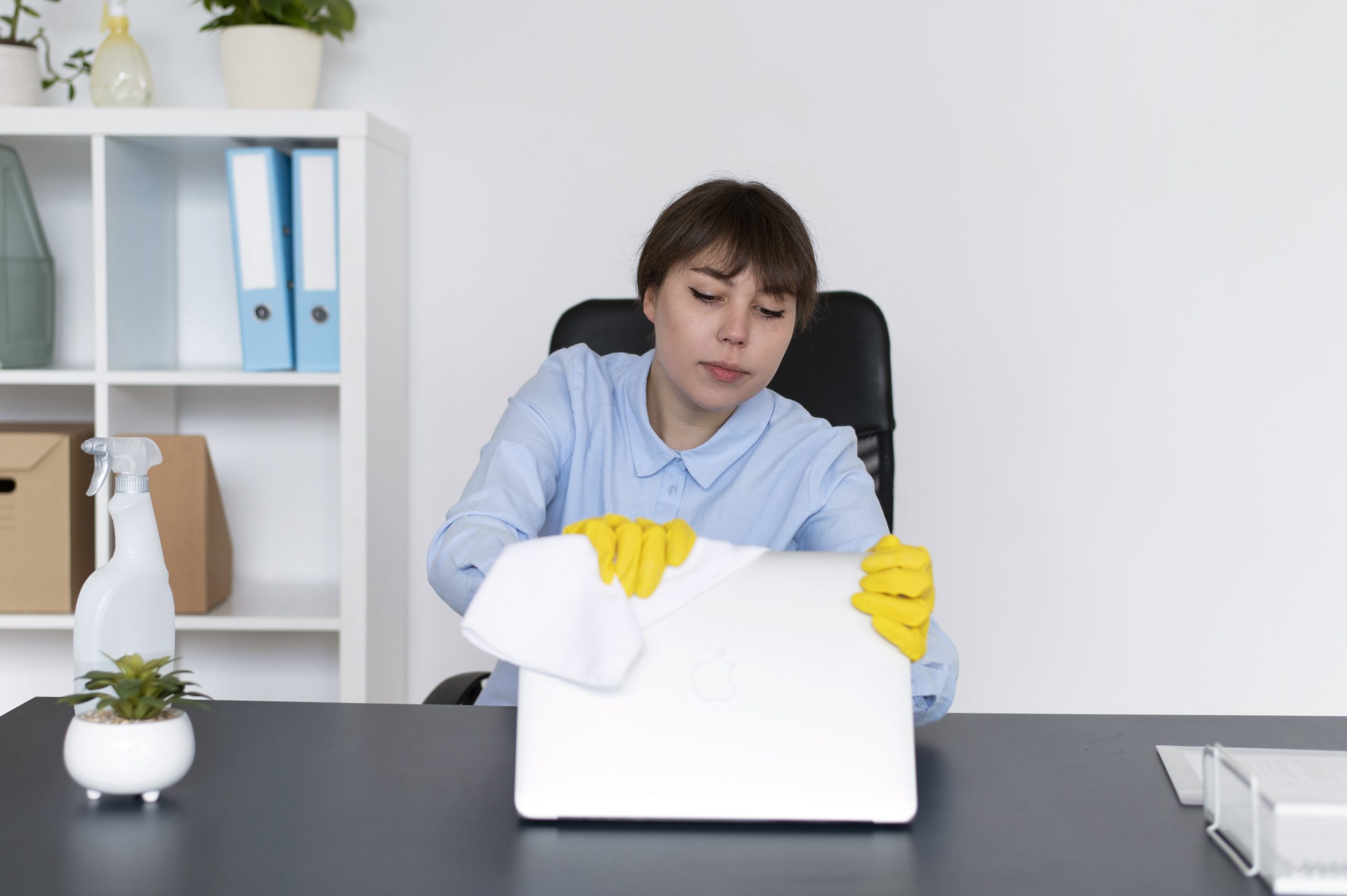 person-taking-care-office-cleaning