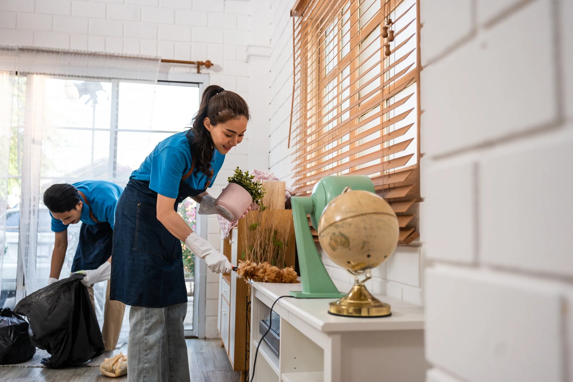 asian-young-man-and-woman-cleaning-service-worker-2025-03-25-07-03-29-utc
