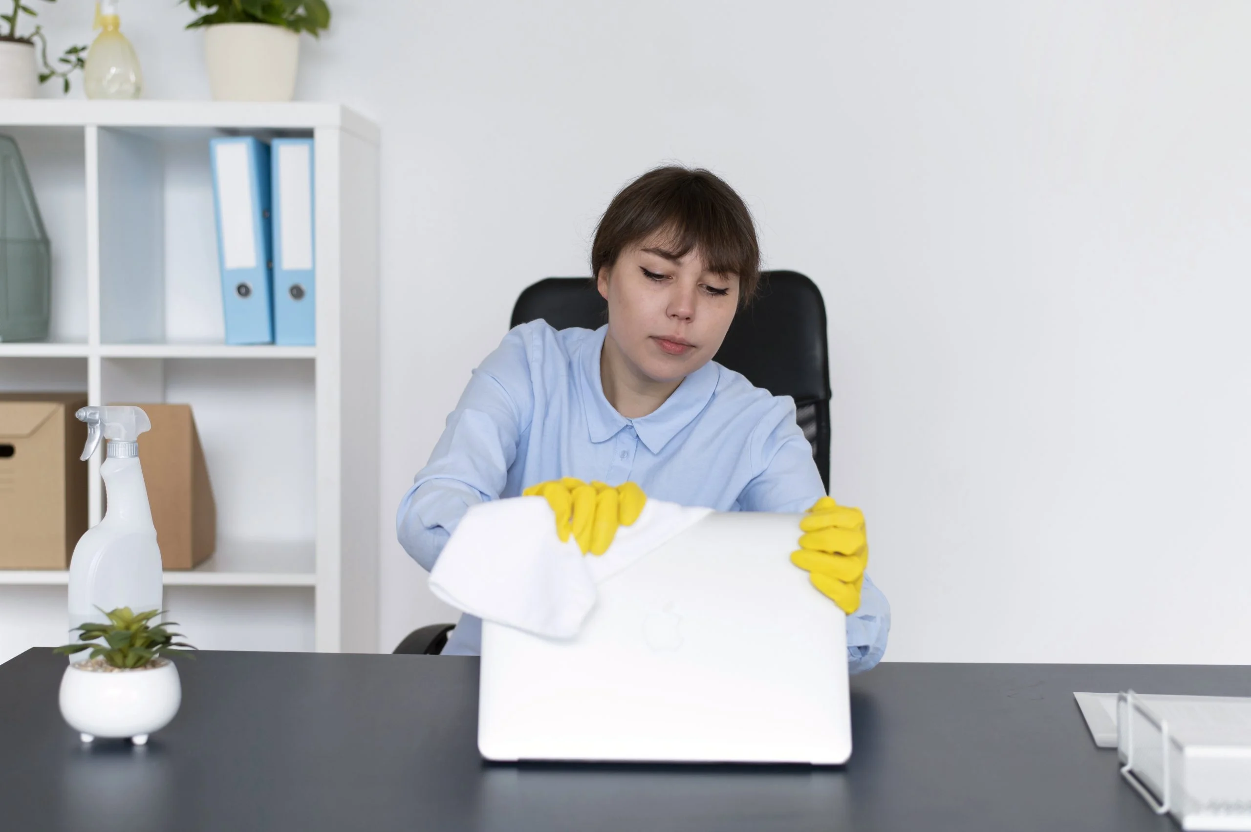 person-taking-care-office-cleaning